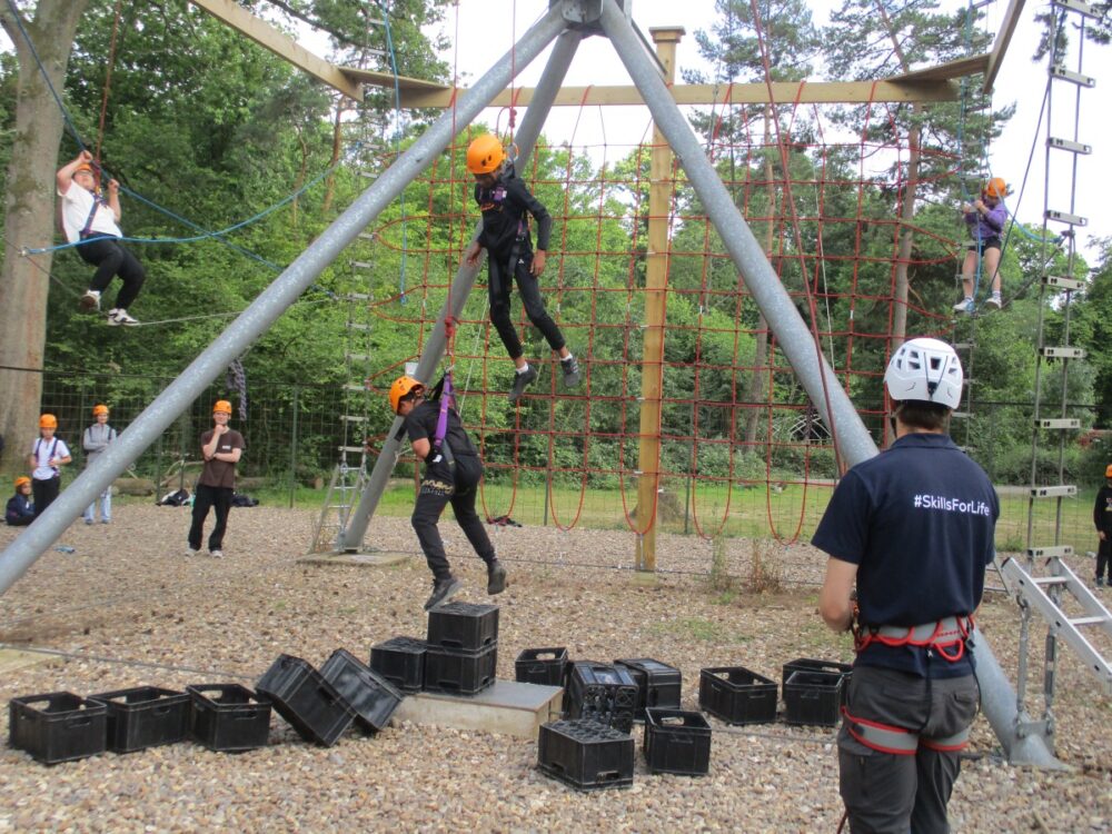 Children tackling an assault course