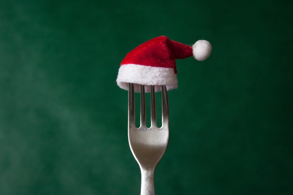 A fork wearing a santa hat